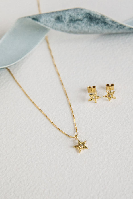 Aros estrellas mini en oro amarillo 18K y diamante