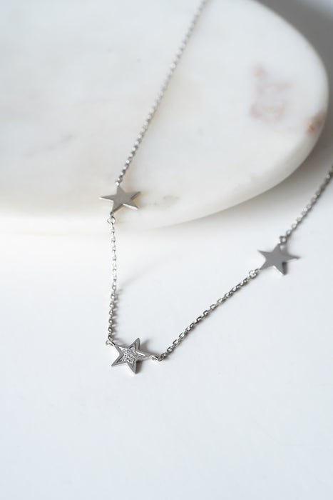 Universo - Cadena con estrellas platino y diamantes 0,06 cts