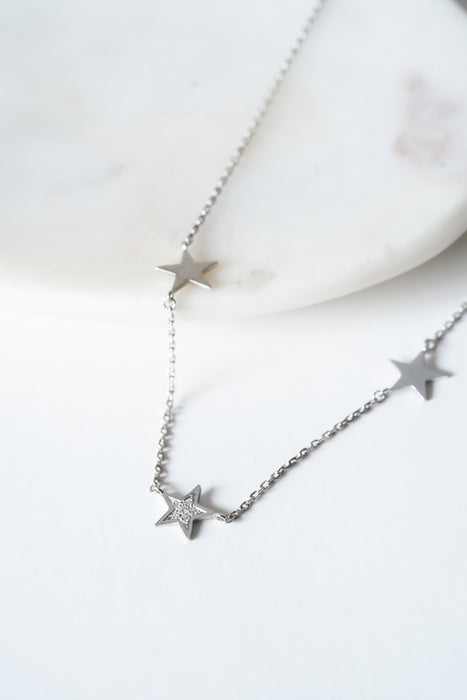 Universo - Cadena con estrellas platino y diamantes 0,06 cts