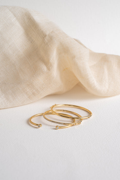 Set de esclavas en oro amarillo 18K con diamantes